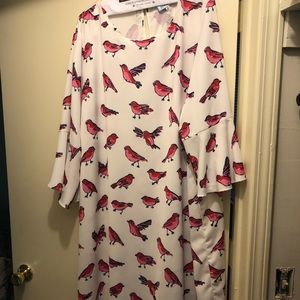 Hummingbird dress with bell sleeves.